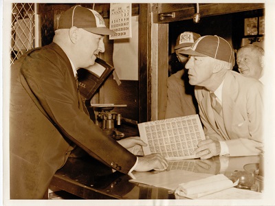 Postmaster General James Farley sells Stamp Sheet to Commissioner Kenesaw Landis, Frick & Heydler Look On